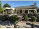 Secluded patio area with lush landscaping, offering an ideal spot for relaxation and outdoor enjoyment at 14247 W 84Th Cir # A, Arvada, CO 80005