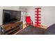 Bedroom with TV, reading chair and personal balcony to create a relaxing atmosphere at 3096 W Prentice Ave # G, Littleton, CO 80123