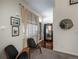 Charming entryway with stylish decor, wood floors, and ample natural light creating a welcoming first impression at 3096 W Prentice Ave # G, Littleton, CO 80123