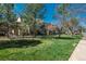 Apartment building with lush lawn and beautiful landscaping, perfect for outdoor enjoyment at 3096 W Prentice Ave # G, Littleton, CO 80123