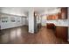 Open-concept layout seamlessly connects the kitchen and living area, enhancing the home's flow and functionality at 10280 W 8Th Ave, Lakewood, CO 80215