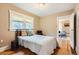 Comfortable bedroom with hardwood floors and windows at 4057 Bryant St, Denver, CO 80211