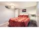Cozy bedroom with decorative bedding, modern lighting, and a serene atmosphere at 4057 Bryant St, Denver, CO 80211