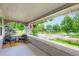 Inviting front porch with comfortable seating and a view of the neighborhood at 4057 Bryant St, Denver, CO 80211