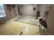 Functional garage space ready for storage or projects; includes a window for natural light at 4057 Bryant St, Denver, CO 80211