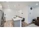 Stylish kitchen with quartz countertops and modern pendant lighting at 8376 Lorenzo Ln # C, Littleton, CO 80129