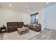 Comfortable living room with neutral tones, plush seating, and natural light at 8376 Lorenzo Ln # C, Littleton, CO 80129