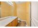 Cozy bathroom featuring a vanity with a sink and a tile floor at 10170 E 151St Ct, Brighton, CO 80602