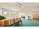 Large bedroom with vaulted ceilings and a bay window offering ample natural light at 10170 E 151St Ct, Brighton, CO 80602