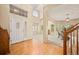 Grand foyer with hardwood floors, high ceilings, and abundant natural light at 10170 E 151St Ct, Brighton, CO 80602
