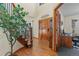 Bright entryway featuring hardwood floors and an office at 20954 E Crestline Pl, Centennial, CO 80015