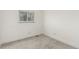 A bright bedroom featuring carpet, a window, and ample space at 2348 Sherman St, Longmont, CO 80501