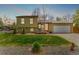 Charming two-story home with a well-maintained lawn and inviting curb appeal at 2348 Sherman St, Longmont, CO 80501