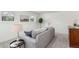 Comfortable living room featuring neutral tones, a plush gray sofa, and a cozy atmosphere at 2348 Sherman St, Longmont, CO 80501