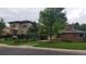 Street view features a single-Gathering brick home with lush landscaping and a neighboring home at 781 Kearney St, Denver, CO 80220