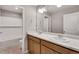 Modern bathroom features dual sinks, a bathtub, and a large mirror, creating a functional space at 14239 Beebalm Ave, Parker, CO 80134