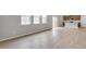 Bright and airy living area with a view of the backyard and an open-concept design at 14239 Beebalm Ave, Parker, CO 80134