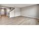 Spacious and bright living room with hardwood floors and neutral paint colors at 14239 Beebalm Ave, Parker, CO 80134