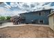 Large backyard with stairs leading up to the second story and a storage shed at 772 Lewiston St, Aurora, CO 80011