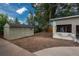 Expansive backyard with shed and unfinished construction at 772 Lewiston St, Aurora, CO 80011