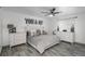 Serene bedroom featuring a plush king-sized bed, soft colors, and ample closet space at 772 Lewiston St, Aurora, CO 80011