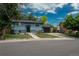 Charming two story home with front yard, driveway, and manicured lawn at 772 Lewiston St, Aurora, CO 80011