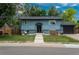 Charming two story home with front yard, driveway, and manicured lawn at 772 Lewiston St, Aurora, CO 80011