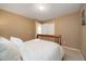 Bedroom with hardwood floors and walls, featuring a view to another room at 11263 Vrain Dr, Westminster, CO 80031