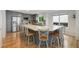 Contemporary kitchen with a large island, stainless steel appliances, and ample counter space at 11263 Vrain Dr, Westminster, CO 80031