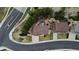 Aerial view showcases the backyard patio, mature trees, and proximity to the nearby roadways at 11710 Crow Hill Dr, Parker, CO 80134