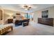 Spacious main bedroom features a luxurious bed, stylish furnishings, and neutral decor at 11710 Crow Hill Dr, Parker, CO 80134