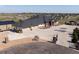 Stunning single-story home featuring an extra garage, circular driveway, rock landscaping, and neutral color palette at 14025 Florence Ct, Brighton, CO 80602