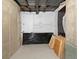 Unfinished basement space for storage or customization featuring concrete walls, ceiling, and floor at 14025 Florence Ct, Brighton, CO 80602