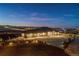 Aerial twilight view of a luxurious home with manicured landscaping at 14025 Florence Ct, Brighton, CO 80602