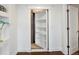 Intriguing hidden door disguised as a bookcase, offering a unique architectural detail and a touch of mystery at 14025 Florence Ct, Brighton, CO 80602