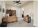 Comfortable home office with wood desk and decor at 14025 Florence Ct, Brighton, CO 80602