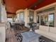 Covered patio with outdoor furniture, grill, and stunning view at 14025 Florence Ct, Brighton, CO 80602