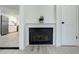 Charming fireplace with a decorative mantel, providing warmth and ambiance to the living space at 12486 W Nevada Pl # 106, Lakewood, CO 80228