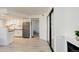 Spacious living area with a modern kitchen, fireplace, and sleek design, perfect for entertaining at 12486 W Nevada Pl # 106, Lakewood, CO 80228
