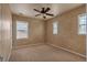 Bedroom with neutral walls and carpet and lots of natural light at 3873 Fairbrook Pt, Highlands Ranch, CO 80130