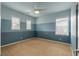 Cozy bedroom with two-tone walls and a ceiling fan at 3873 Fairbrook Pt, Highlands Ranch, CO 80130