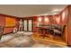 Unique dining space features a custom elevated dining booth and Star Wars decor at 3873 Fairbrook Pt, Highlands Ranch, CO 80130