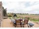 An outdoor patio featuring comfortable seating and a cozy fire pit at 3873 Fairbrook Pt, Highlands Ranch, CO 80130