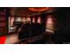 In-home movie theatre with comfortable seating and large projector screen at 3873 Fairbrook Pt, Highlands Ranch, CO 80130