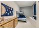 bedroom with carpet, twin bunk bed, and drawers at 17423 Cornerstone Ln, Parker, CO 80134
