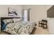 Bedroom with carpet, queen bed, window, and chair at 17423 Cornerstone Ln, Parker, CO 80134