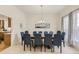 Formal dining room featuring a large table, stylish chairs, and elegant decor at 17423 Cornerstone Ln, Parker, CO 80134