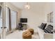 Bright home office with a modern desk, comfortable seating, and ample natural light at 17423 Cornerstone Ln, Parker, CO 80134