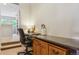 A cozy office nook with built-in desk and storage, perfect for working from home at 22932 E Ontario Dr # 102, Aurora, CO 80016