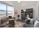 Bright bedroom with built-in shelving and workspace at 10291 E 62Nd Pl, Denver, CO 80238